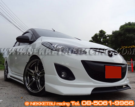 ش Mazda2 ç Audi