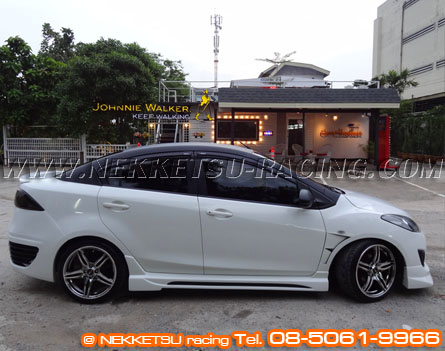 ش Mazda2 ç Audi